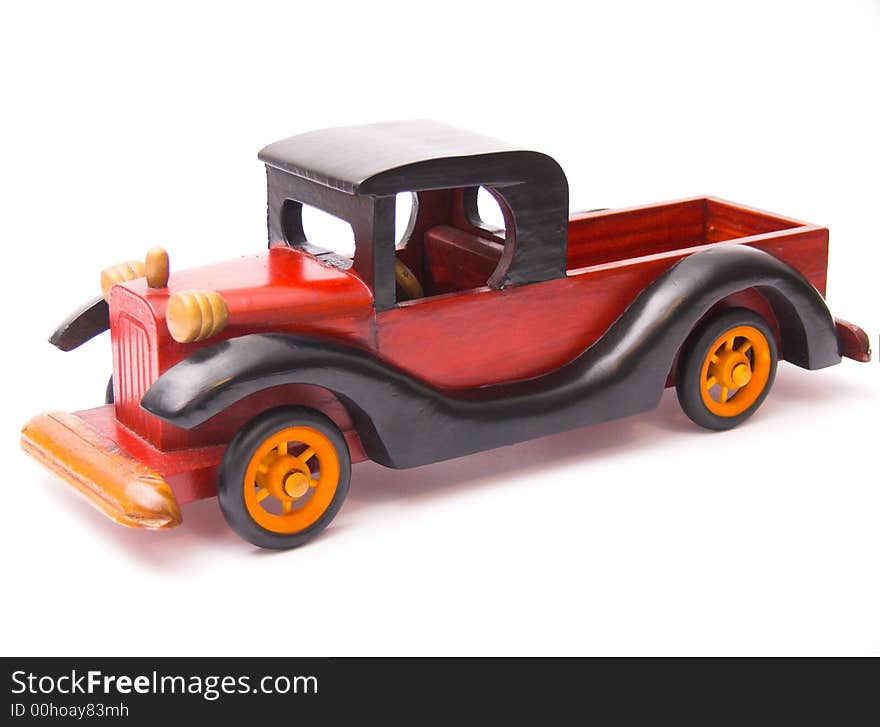 Wooden car toy - isolated over white background. Wooden car toy - isolated over white background