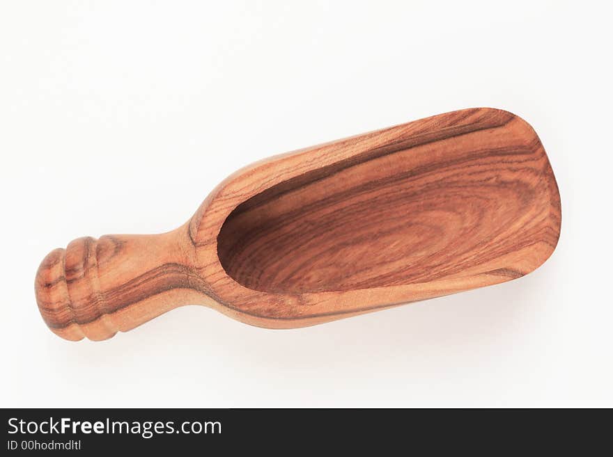 An empty small wooden shovel for use in the kitchen. An empty small wooden shovel for use in the kitchen