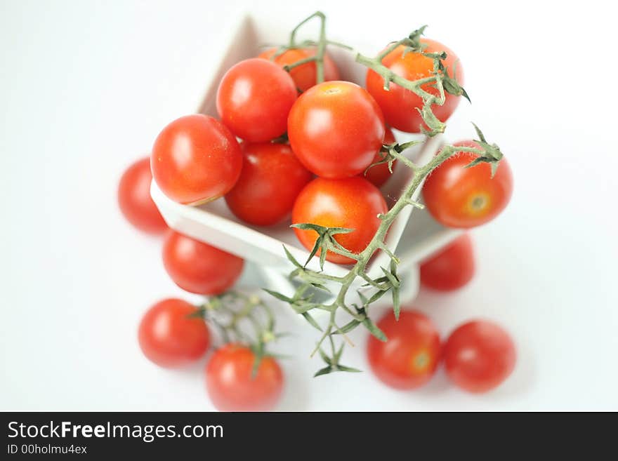 Fresh tomatoes in square bowl