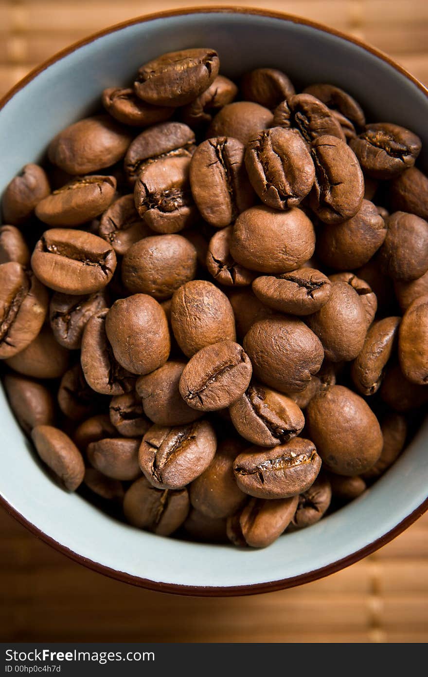 Coffee beans in the cup