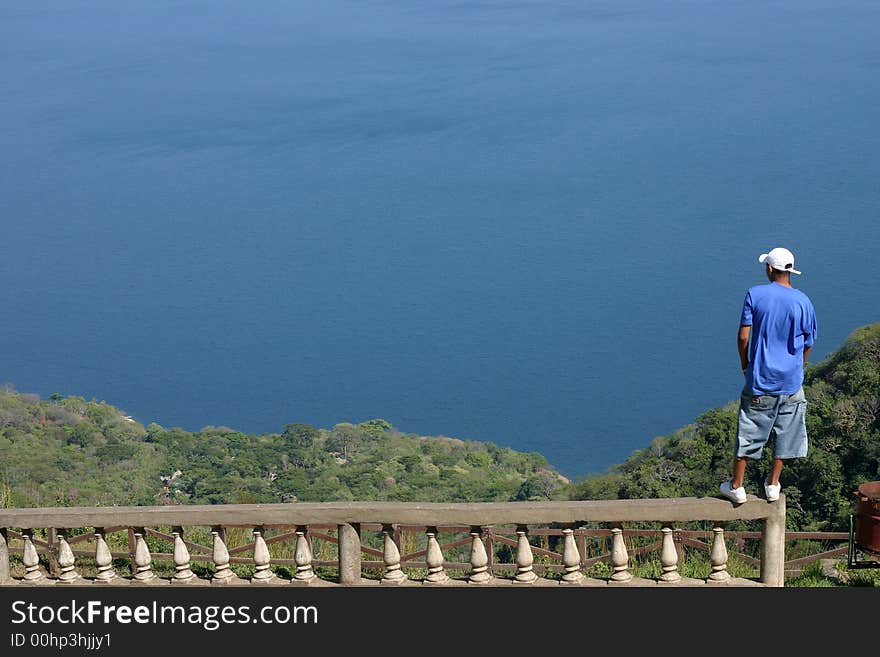 Guy watching over Laguna Apoyo in Nicaragua