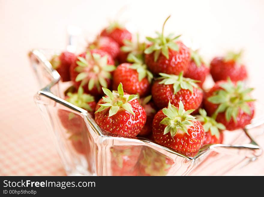 Fresh strawberries in star shaped glass bowl