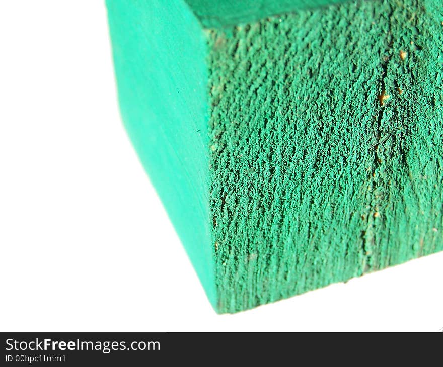 Green Cubic block made of wood. Green Cubic block made of wood.