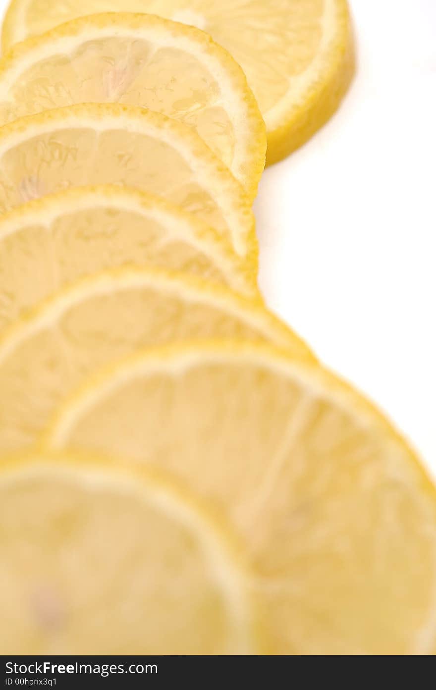 Slices of lemon on the white background