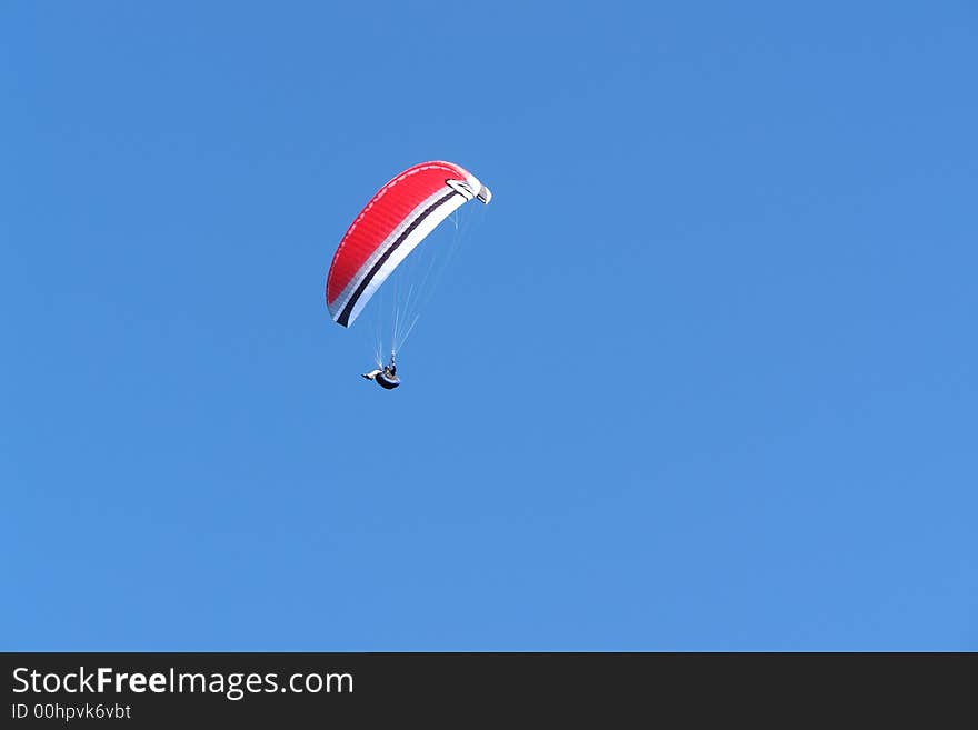 Red Paraplan in the Skies.