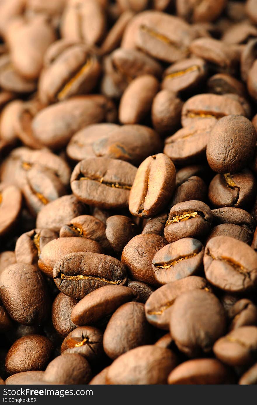 Fried grains of Arabian coffee, close up. Fried grains of Arabian coffee, close up