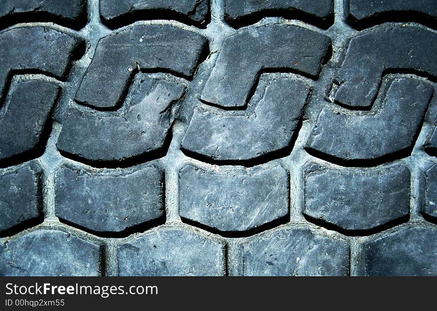 Old truck tire texture background. Macro