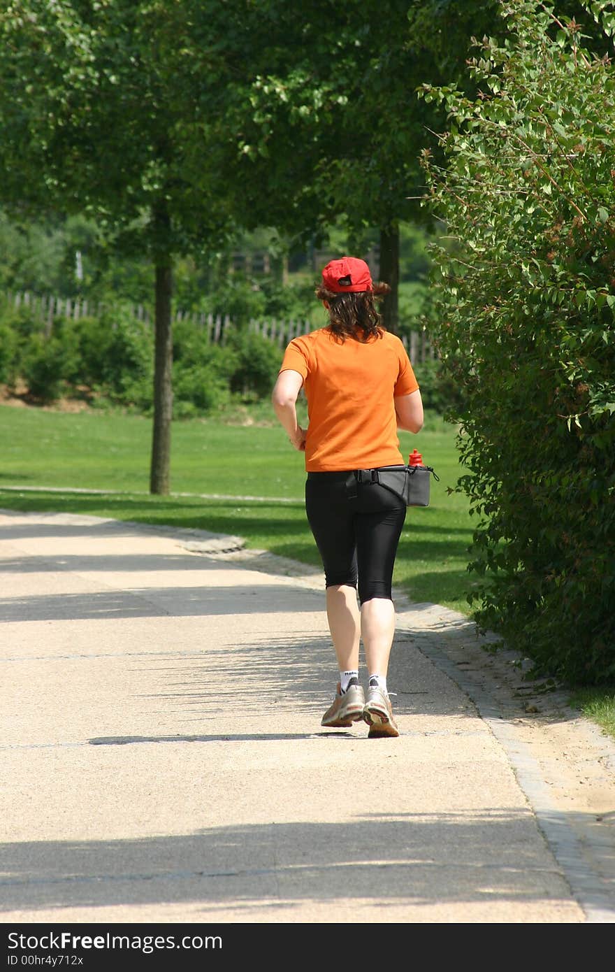 Woman practising footing in a park. Woman practising footing in a park