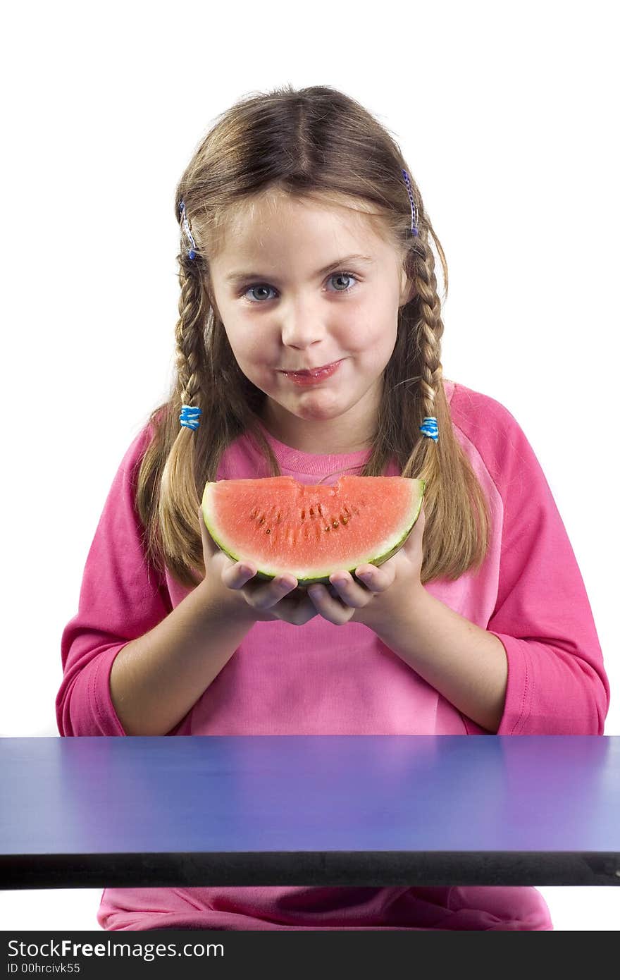 Adorable girl eating watermelon a over white background. Adorable girl eating watermelon a over white background