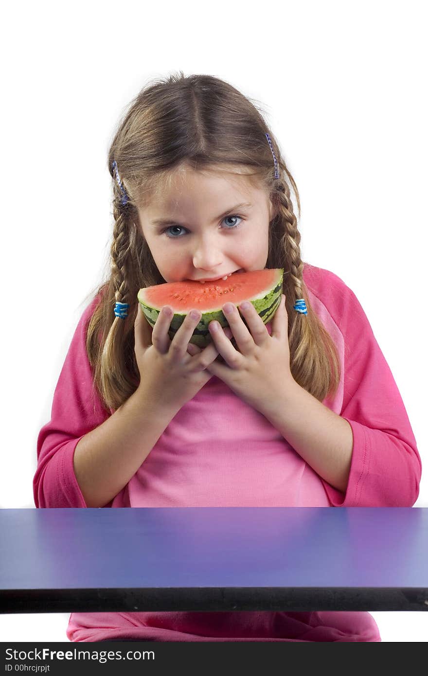 Adorable girl eating watermelon a over white background. Adorable girl eating watermelon a over white background