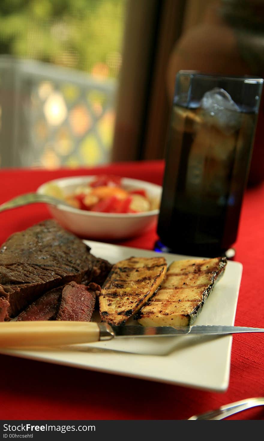 Fresh off the grill , Sirloin and Zucchini Squash with a cucumber and tomato Salad picked from the garden. Fresh off the grill , Sirloin and Zucchini Squash with a cucumber and tomato Salad picked from the garden