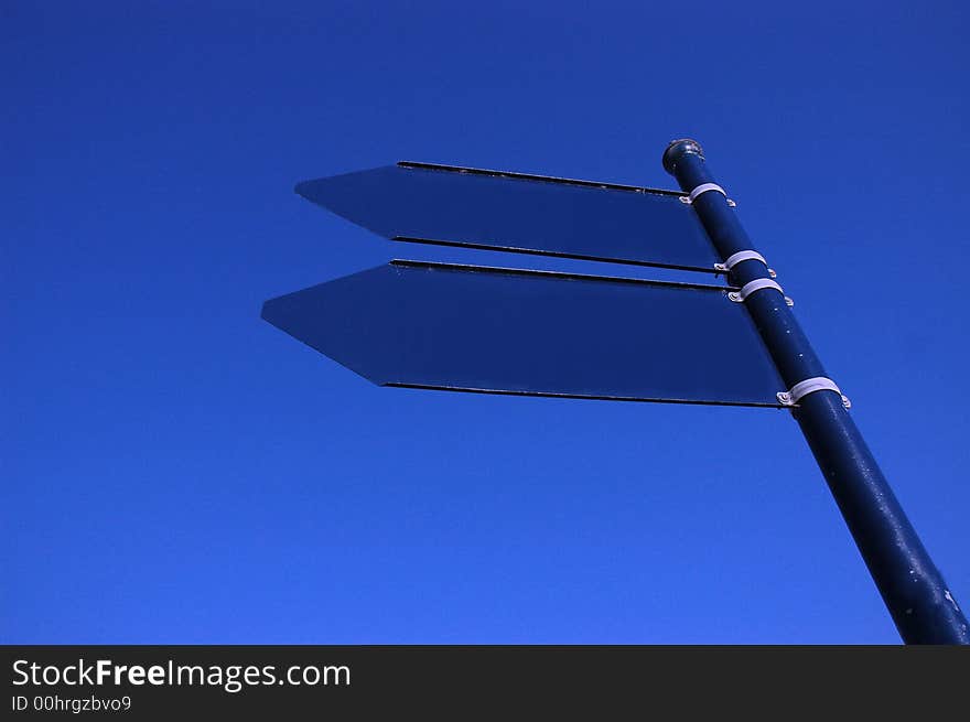 Photo empty sign on the blue sky. Photo empty sign on the blue sky