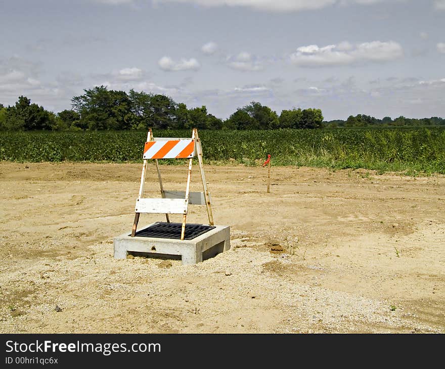 A construction sign, warning people to stay away. A construction sign, warning people to stay away.