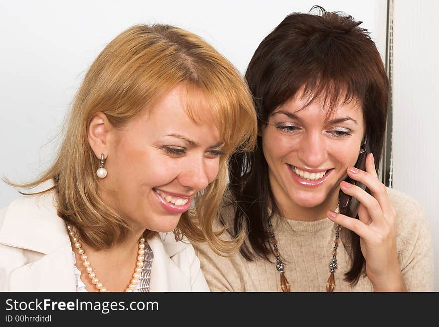 Two Young  woman with a mobile