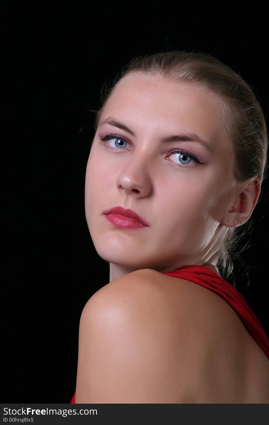 Portrait of a woman on black background