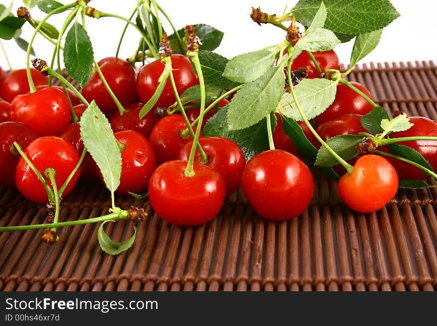 Red cherry jam isolated on white -brown