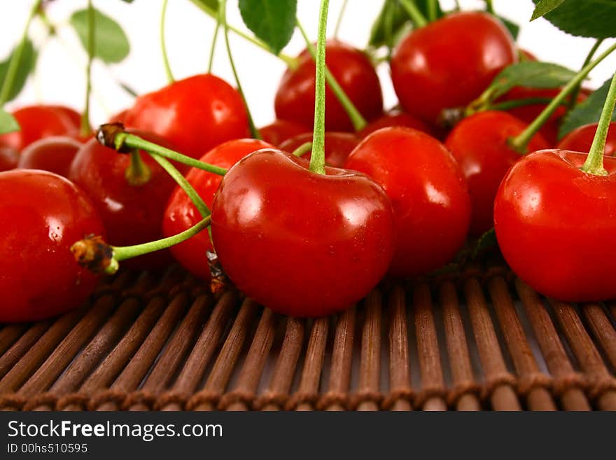 Red cherry  isolated on white -brown