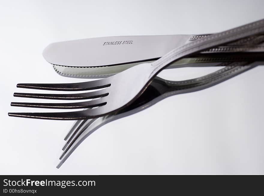 Close up of Knife and fork on white