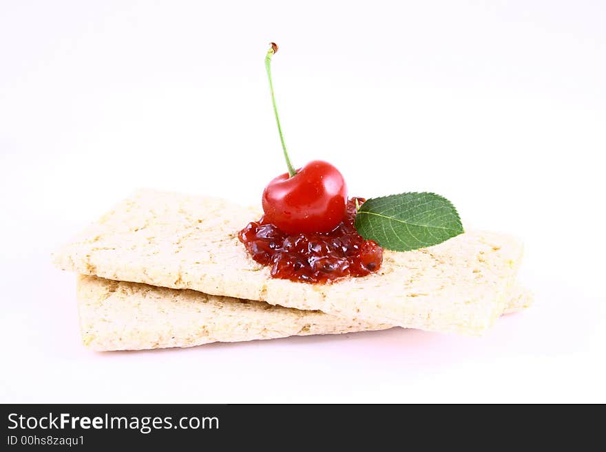 Red cherry jam isolated on white -brown. Red cherry jam isolated on white -brown