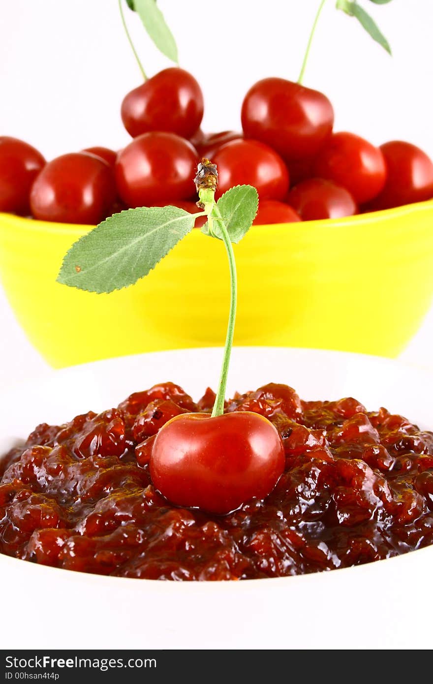 Red cherry jam isolated on white -brown. Red cherry jam isolated on white -brown