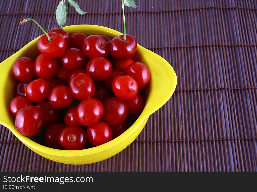 Red cherry 100 isolated on white -brown