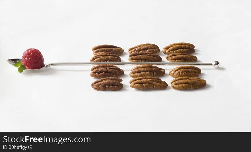 Raspberry spoon with walnuts, designed. Raspberry spoon with walnuts, designed