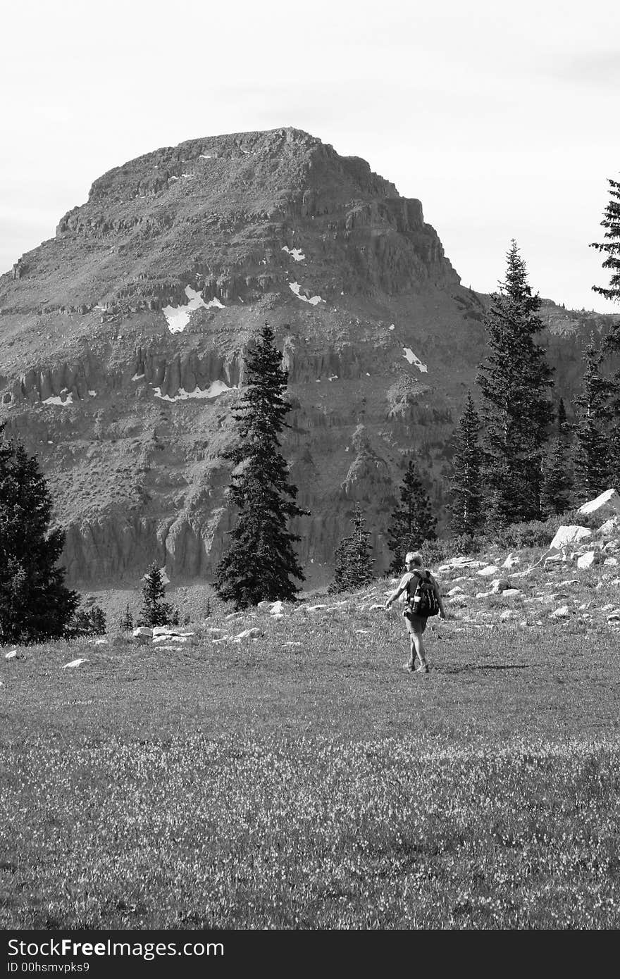 A man hiking and admires the view B+W. A man hiking and admires the view B+W