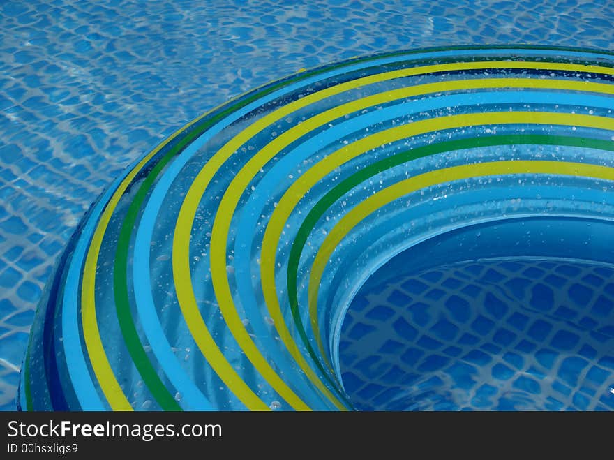 A swimming-belt in a swimming-pool. A swimming-belt in a swimming-pool.