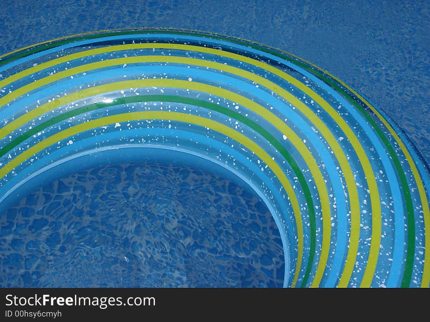 A swimming-belt in a swimming-pool. A swimming-belt in a swimming-pool.