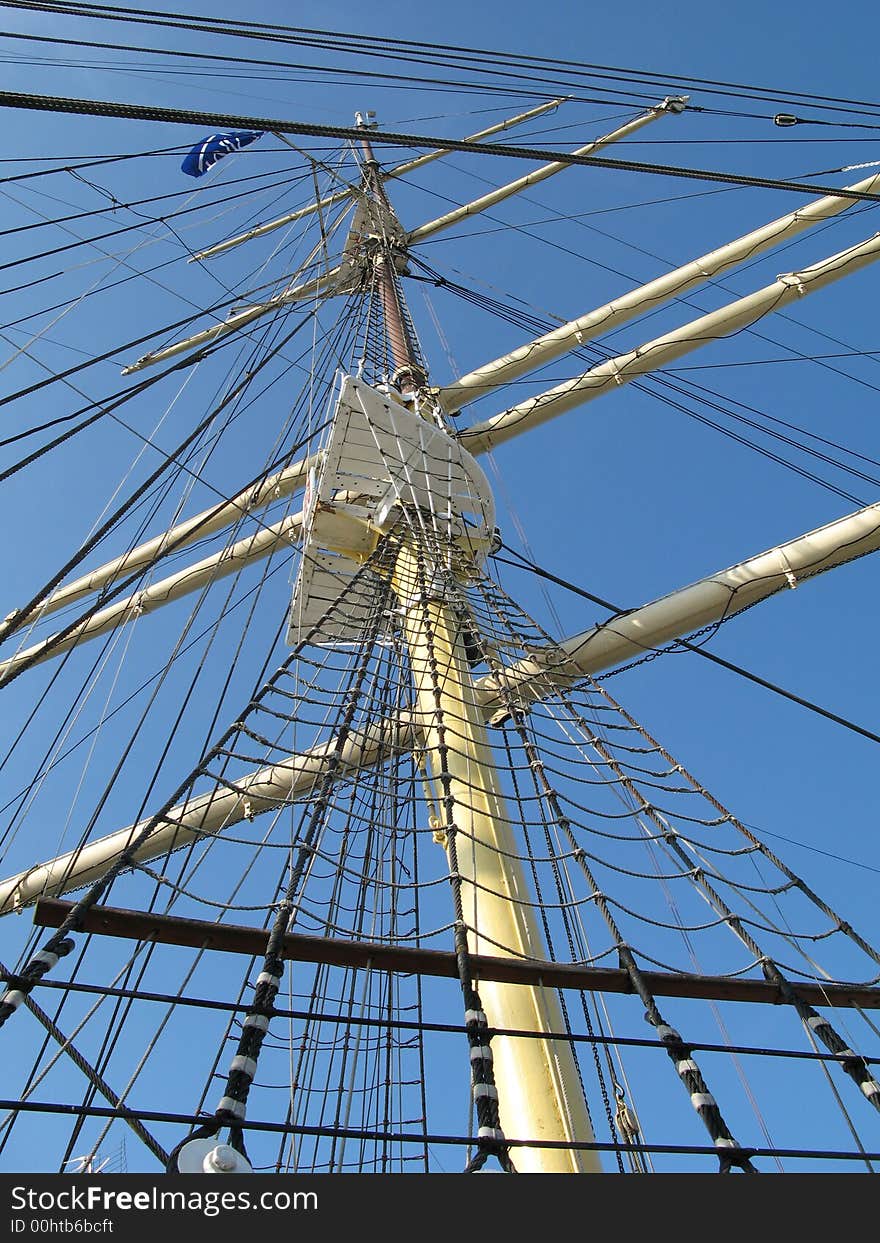 Big and old sailing ship in a harbour of Gdynia, Poland. Satrboard of a ship. Big and old sailing ship in a harbour of Gdynia, Poland. Satrboard of a ship.