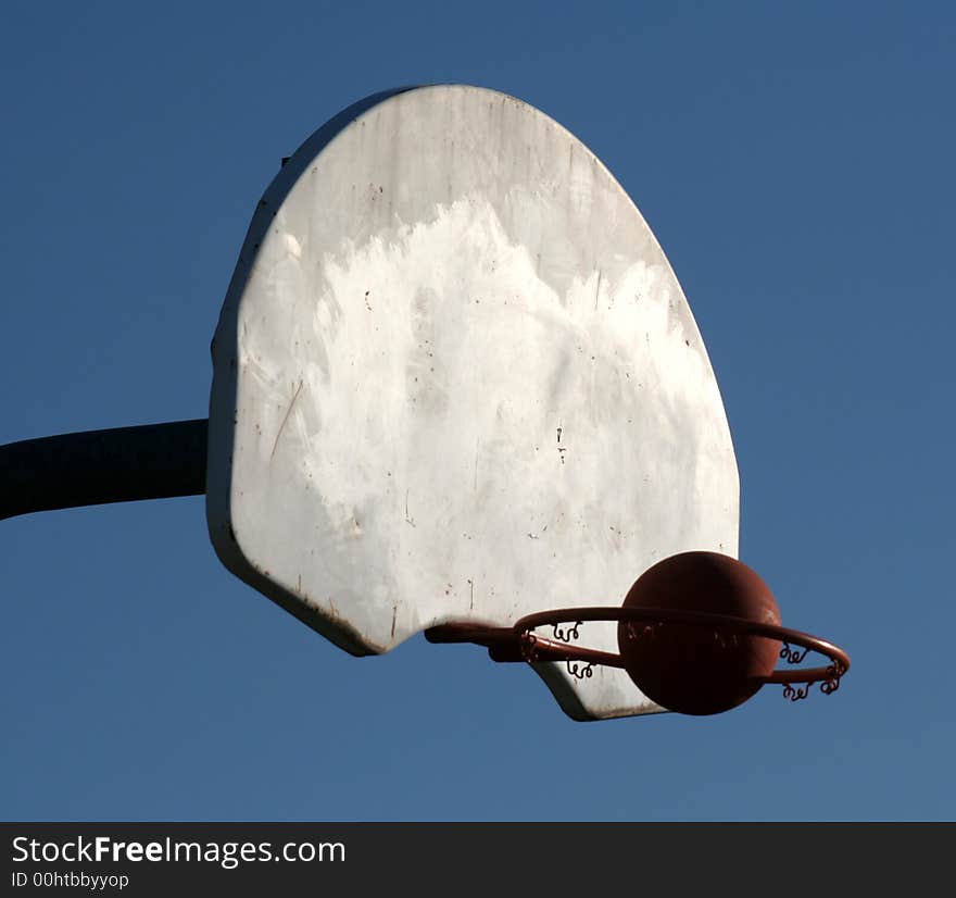 A basketball headed for the hoop. A basketball headed for the hoop.