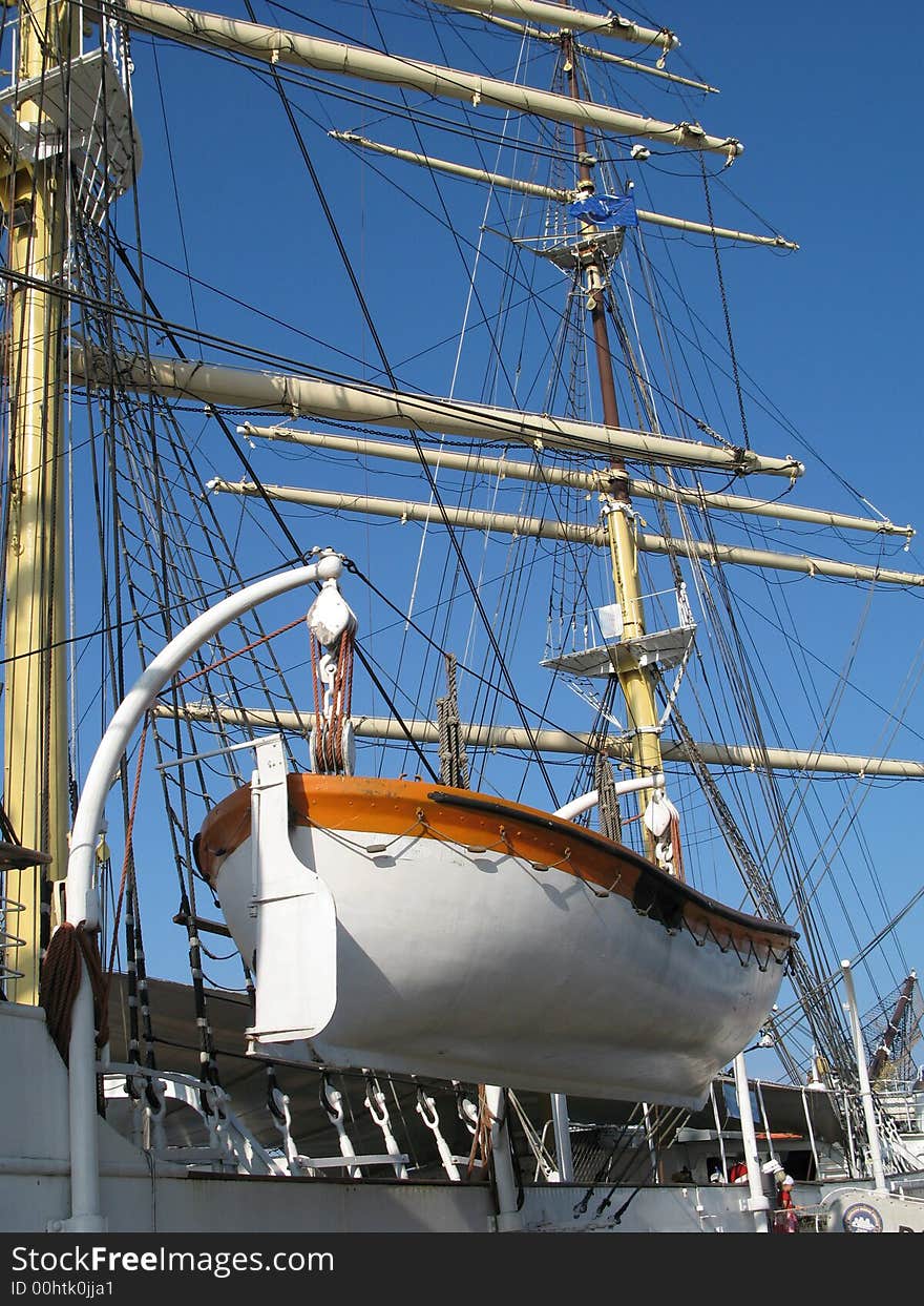 Big and old sailing ship in a harbour of Gdynia, Poland. Life boat. Big and old sailing ship in a harbour of Gdynia, Poland. Life boat.