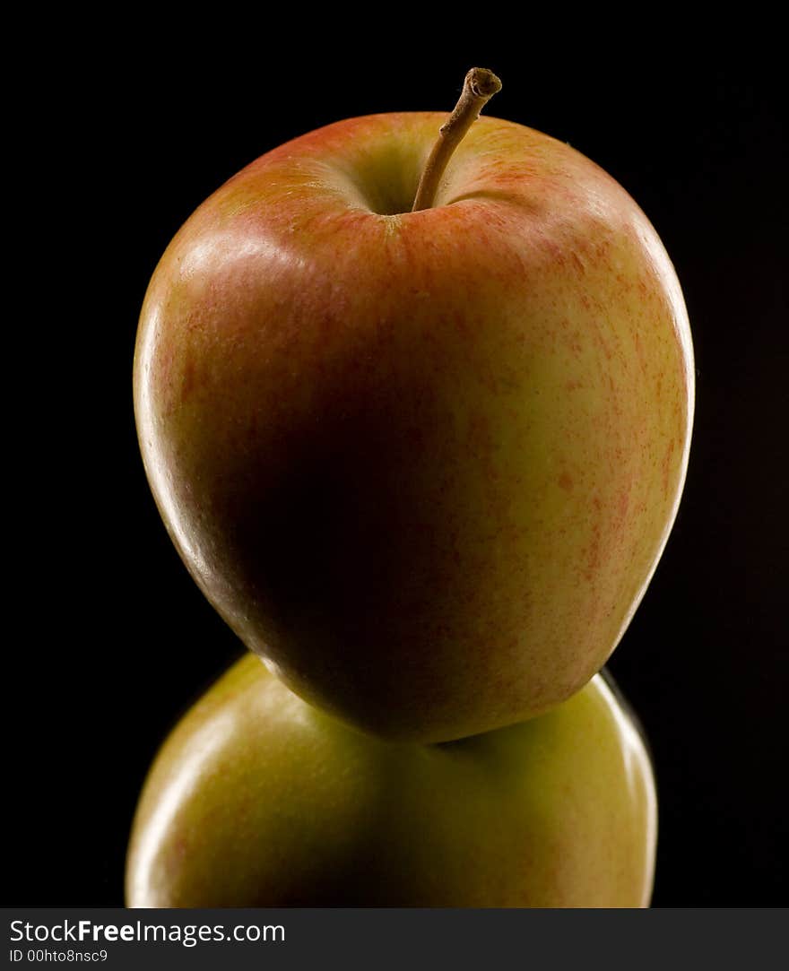 Close up of an apple with reflection