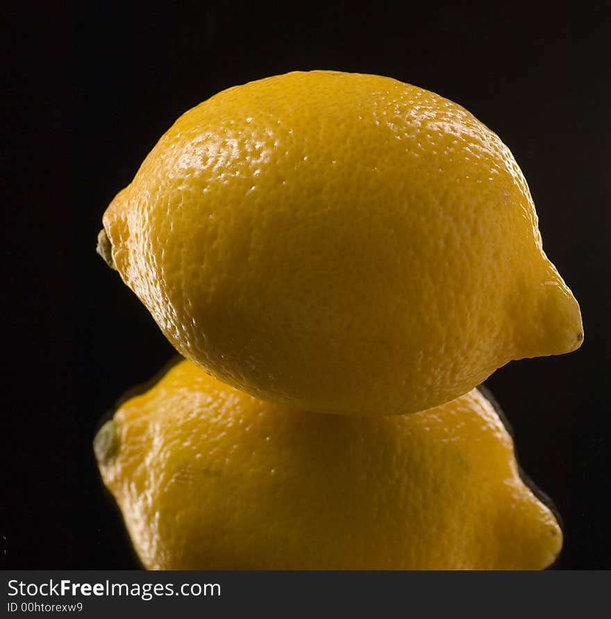 Reflection and Close up of a Lemon