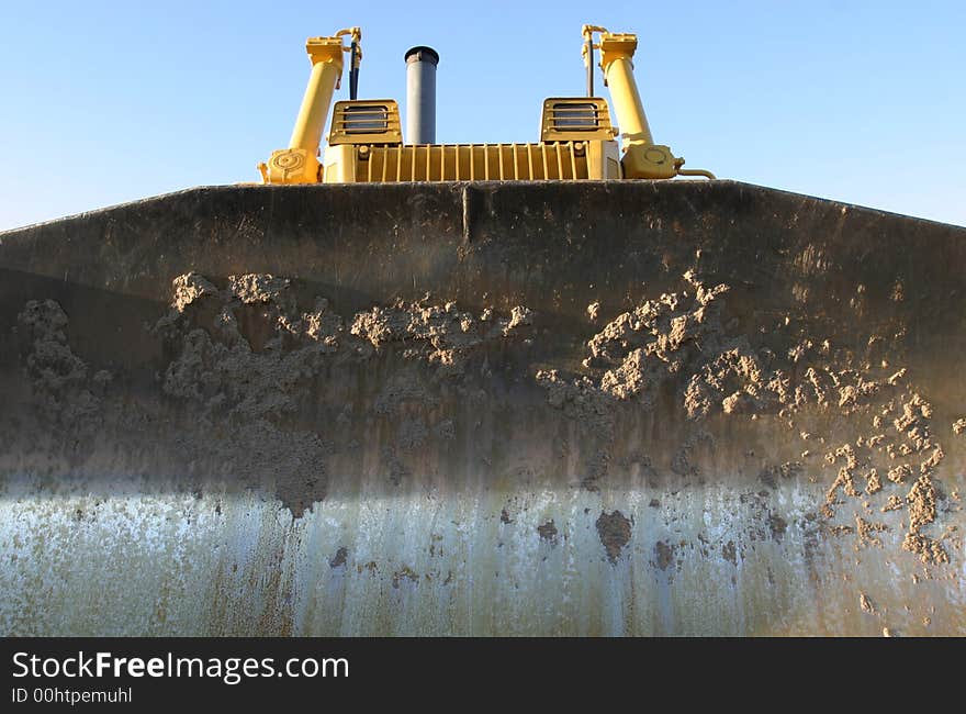 Bulldozer Blade At Sunset