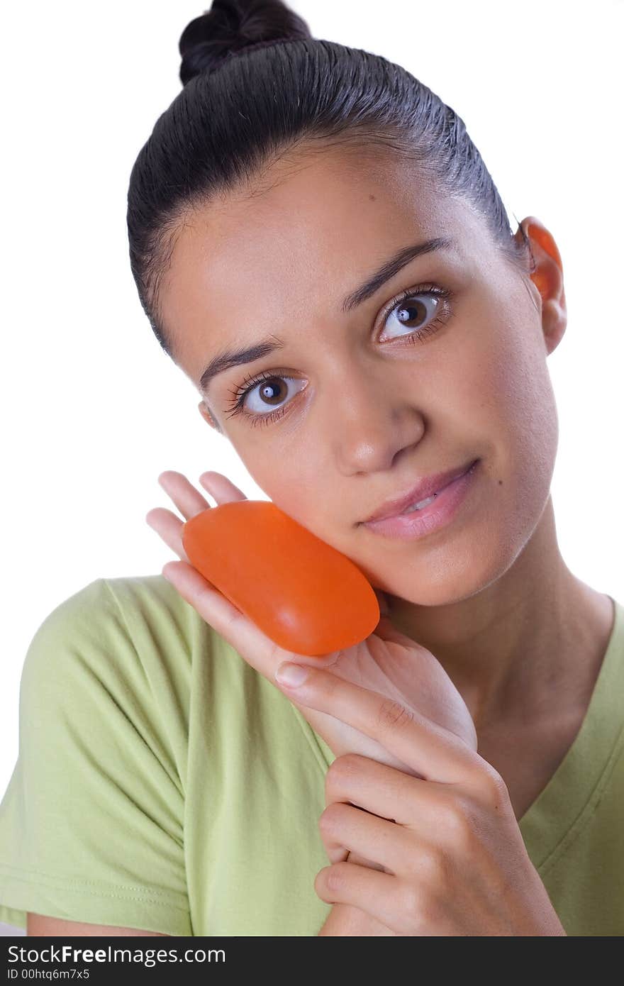 Beautiful girl holding orange soup. Beautiful girl holding orange soup