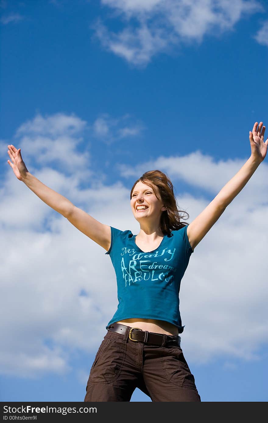 Young, beautiful woman is happy in nature. Young, beautiful woman is happy in nature