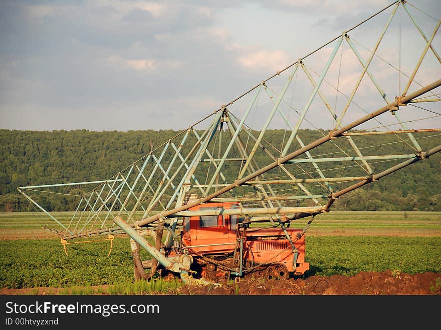 Old sprinkler in the giant tillage