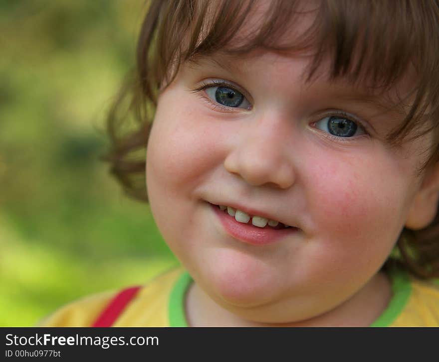 Happy smiling child portrait close-up. Happy smiling child portrait close-up