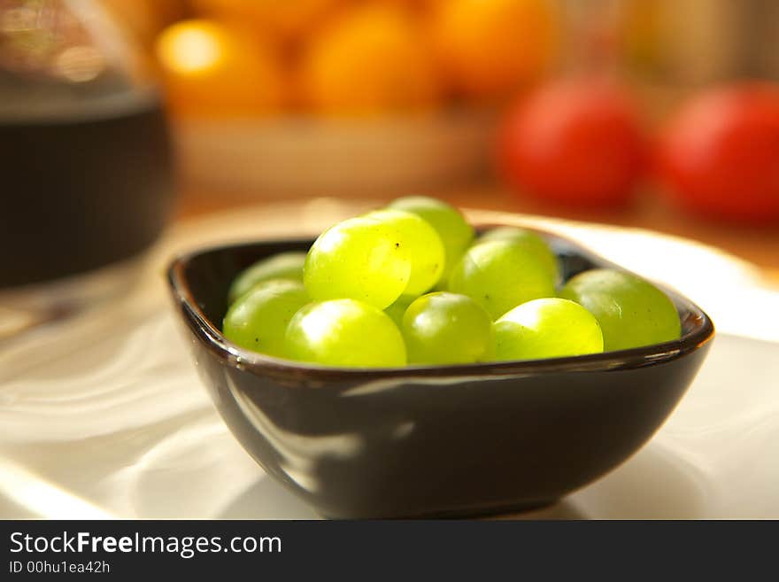 Fresh green grapes fruits in porcelain