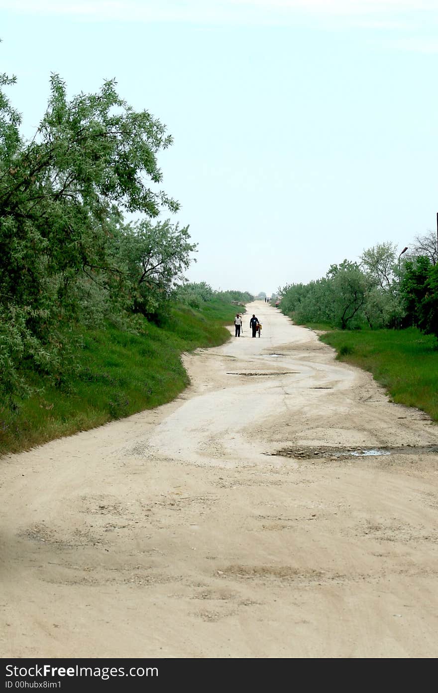 A long and curved road at the country