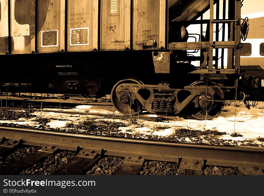 Sepia tone photo of a railroad car sitting on the tracks. Sepia tone photo of a railroad car sitting on the tracks.