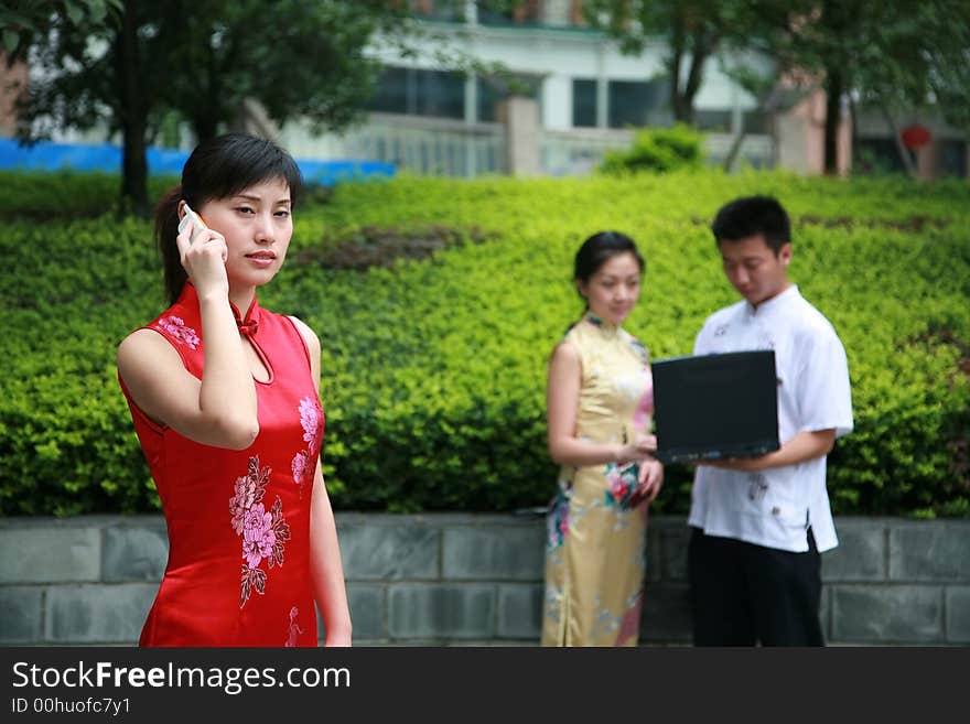 Three asian young people in garden. Three asian young people in garden