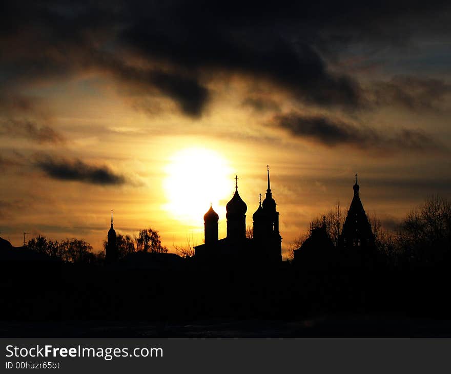 Ancient building. Wall. Tower. Church on the sunset. Ancient building. Wall. Tower. Church on the sunset