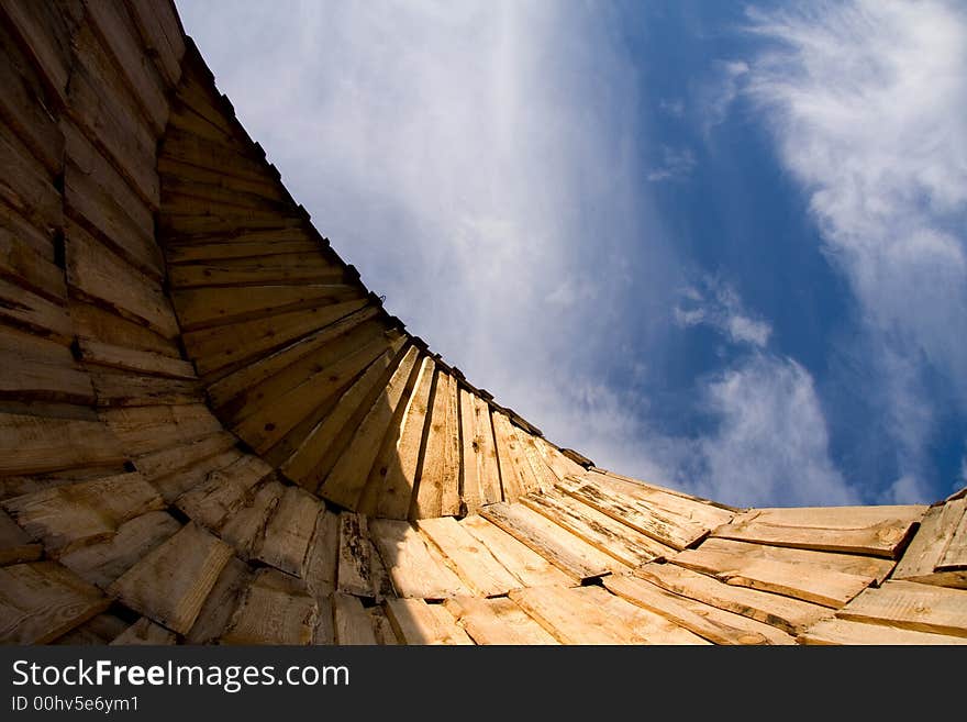 Wall or semi-hut. Wooden architecture day blue sky. Wall or semi-hut. Wooden architecture day blue sky.