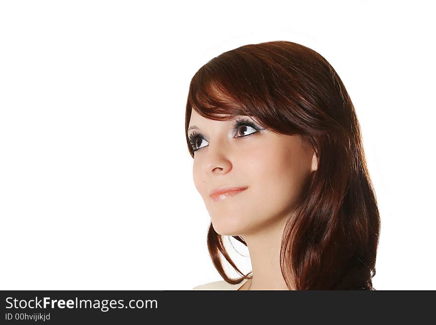 Portrait of the young beautiful girl on a white background