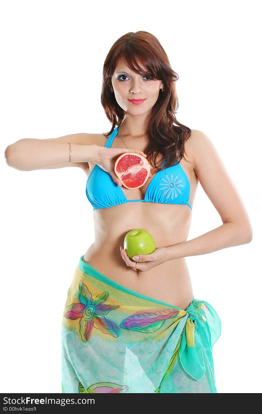 The beautiful sexual girl in bikini with fruit. The beautiful sexual girl in bikini with fruit