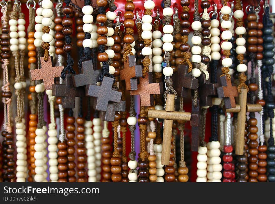 An assorted group of crosses from a street shop close to a catholic church. An assorted group of crosses from a street shop close to a catholic church.