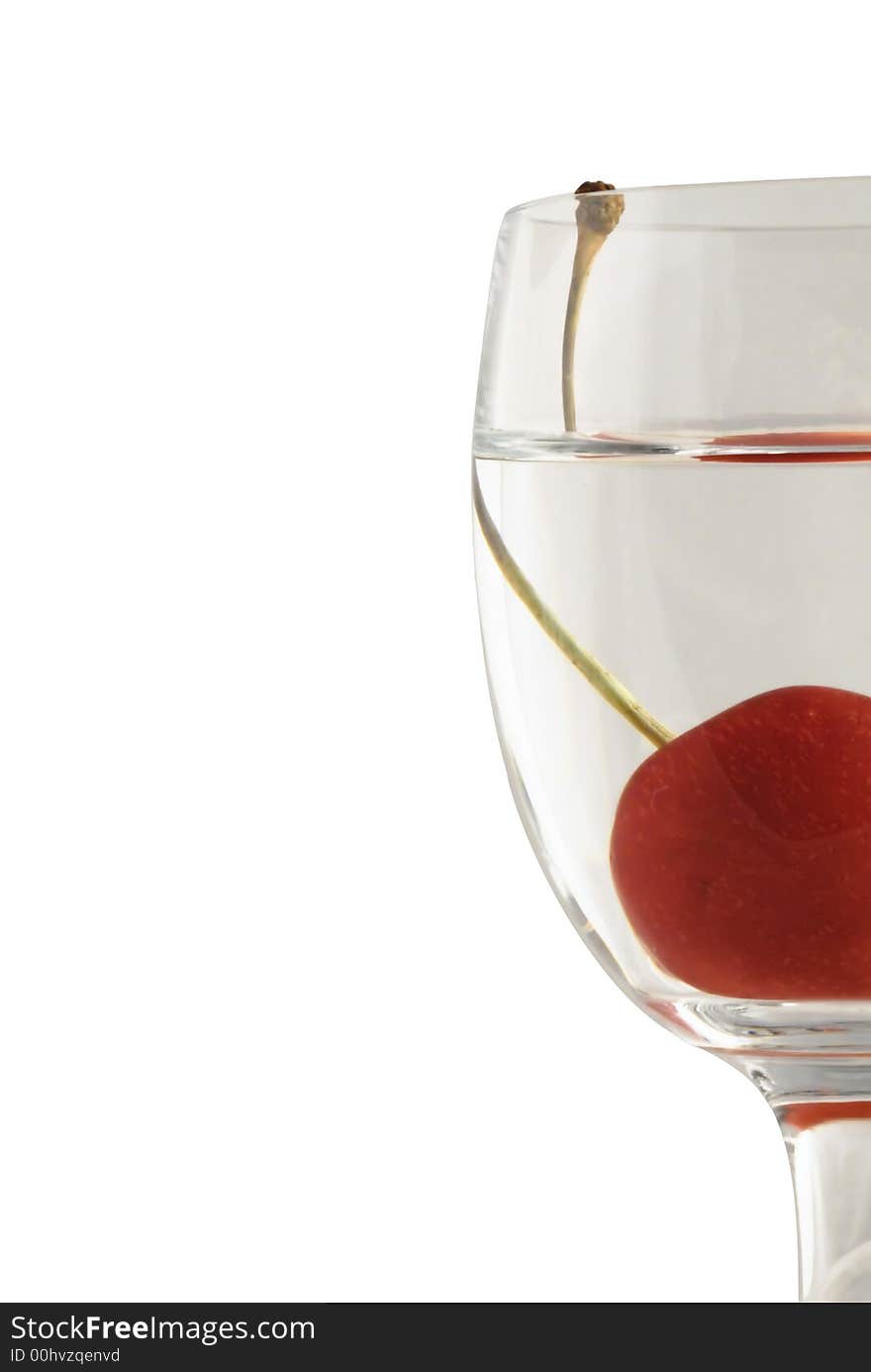 Cherry in glass on white background