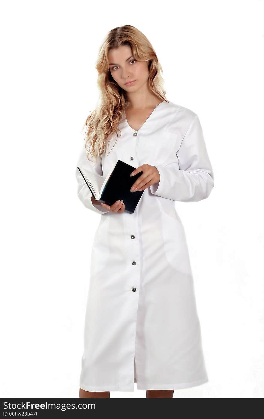 Young woman in white on the white background with book. Young woman in white on the white background with book